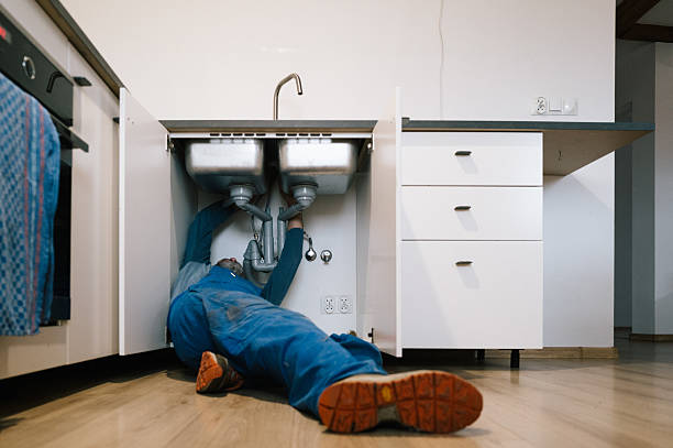 Professional Emergency Plumber technician working in Fort Atkinson, WI